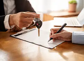 Signing a Car Loan Contract